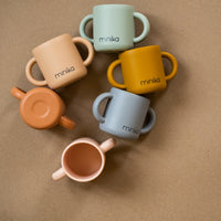 Tasse d'apprentissage avec poignée